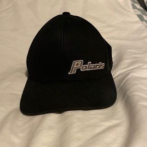 Polaris black adjustable baseball hat.  Never worn just kept in sled.